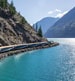 Train passing by a lake