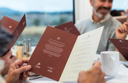 Group looking at the food menu